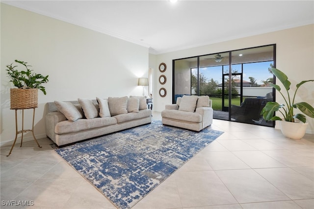 living room with light tile patterned floors and crown molding