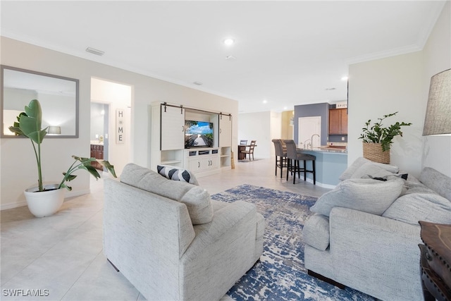 living room featuring light tile patterned flooring and ornamental molding