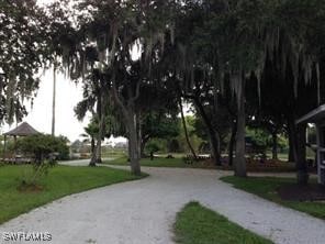 view of community featuring a lawn