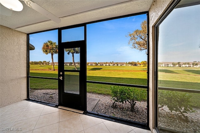 unfurnished sunroom featuring plenty of natural light