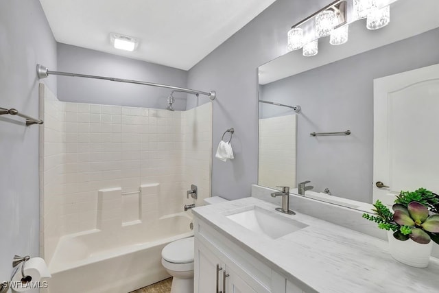 full bathroom with vanity, toilet, and tub / shower combination