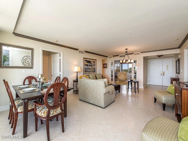 6849 Grenadier Blvd Unit 502, Naples, FL 34108 - dining area with light tile patterned floors, baseboards, ornamental molding, and a chandelier