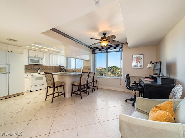 6849 Grenadier Blvd Unit 502, Naples, FL 34108 - office space with baseboards, light tile patterned floors, and ceiling fan
