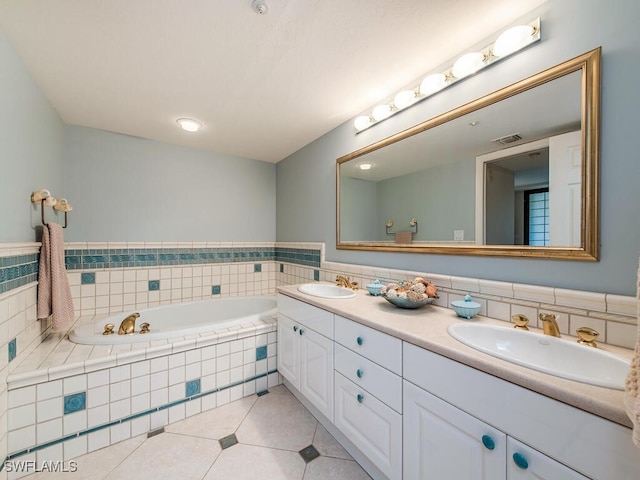 6849 Grenadier Blvd Unit 502, Naples, FL 34108 - bathroom with tile patterned floors, double vanity, and a bath