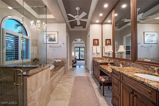 bathroom featuring vanity, ceiling fan, ornamental molding, and plus walk in shower