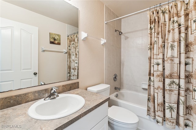 full bathroom featuring vanity, toilet, and shower / tub combo with curtain