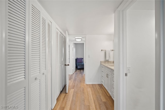 hallway featuring light hardwood / wood-style flooring