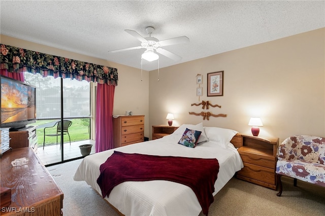 bedroom featuring access to outside, ceiling fan, light colored carpet, and a textured ceiling