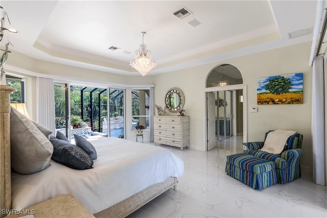 bedroom featuring ornamental molding, access to exterior, a chandelier, and a tray ceiling