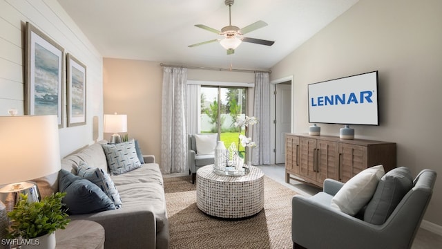 living room featuring ceiling fan and lofted ceiling