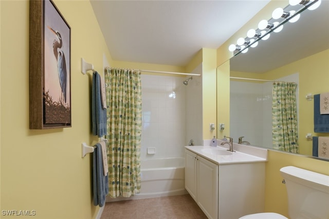 full bathroom with toilet, shower / tub combo, vanity, and tile patterned floors