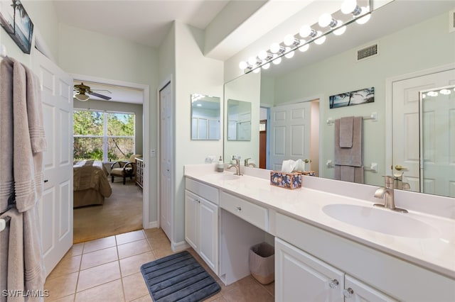 bathroom featuring vanity, tile patterned flooring, and ceiling fan