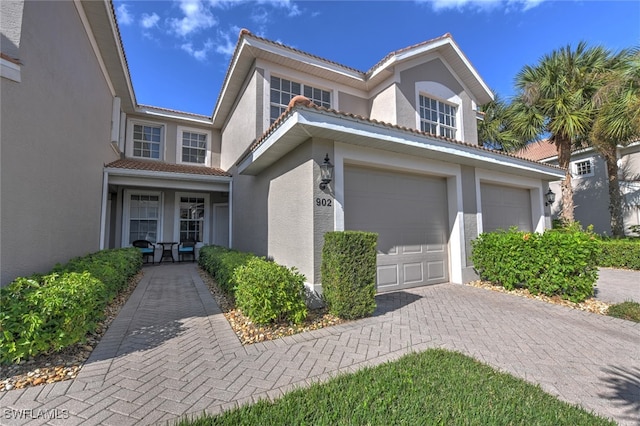 view of front of property featuring a garage