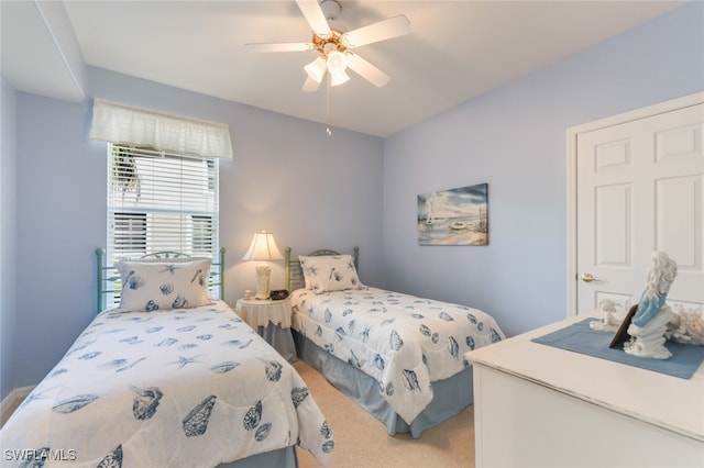 bedroom featuring carpet and ceiling fan