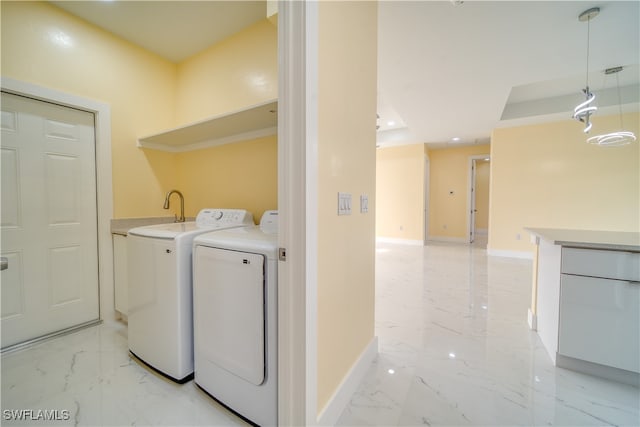 laundry room with independent washer and dryer