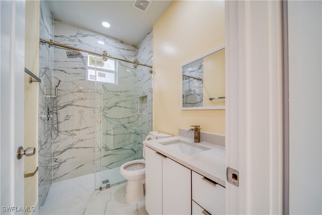 bathroom with toilet, vanity, and an enclosed shower