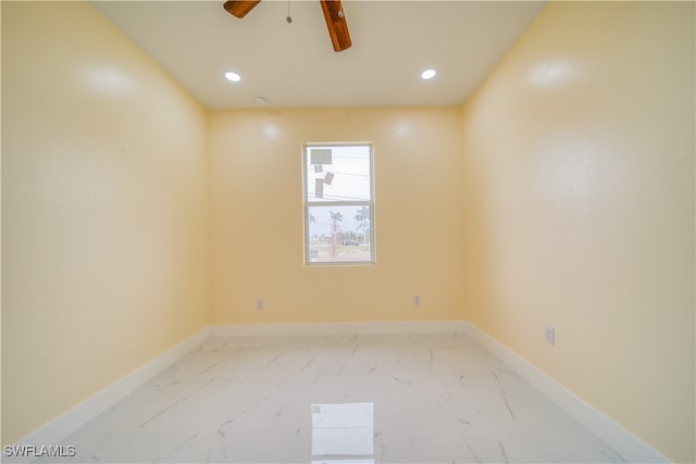 empty room featuring ceiling fan