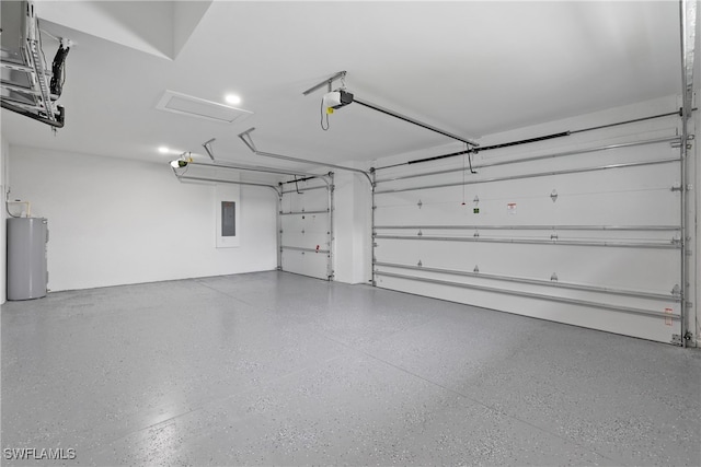 garage with water heater, a garage door opener, and electric panel