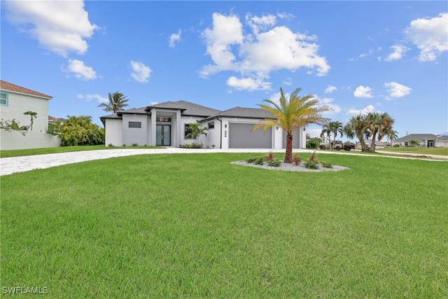 view of front facade featuring a front yard and a garage