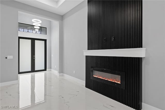 foyer featuring a tile fireplace