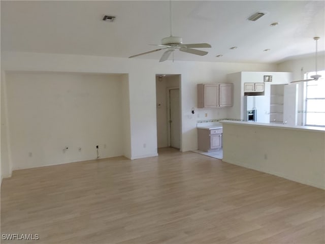 interior space with light hardwood / wood-style flooring and ceiling fan