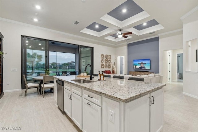 kitchen with a sink, visible vents, dishwasher, and ornamental molding