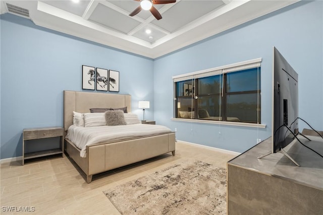 bedroom featuring beam ceiling, baseboards, coffered ceiling, and ceiling fan