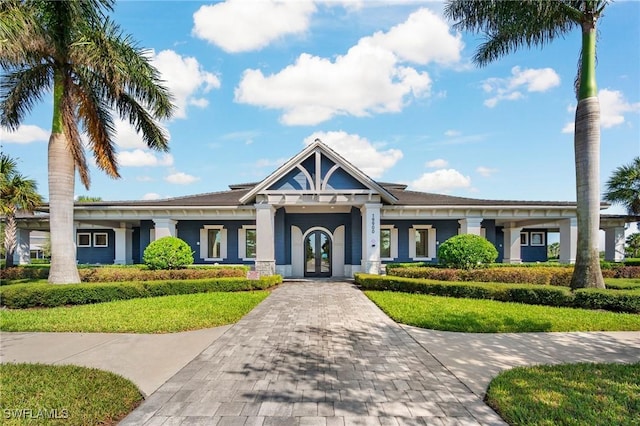 view of front of property with french doors and stucco siding