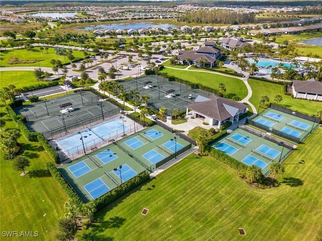 aerial view featuring a residential view and a water view