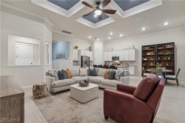 living room featuring visible vents, a ceiling fan, coffered ceiling, recessed lighting, and crown molding