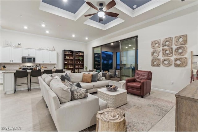 living area featuring recessed lighting, a ceiling fan, coffered ceiling, and ornamental molding