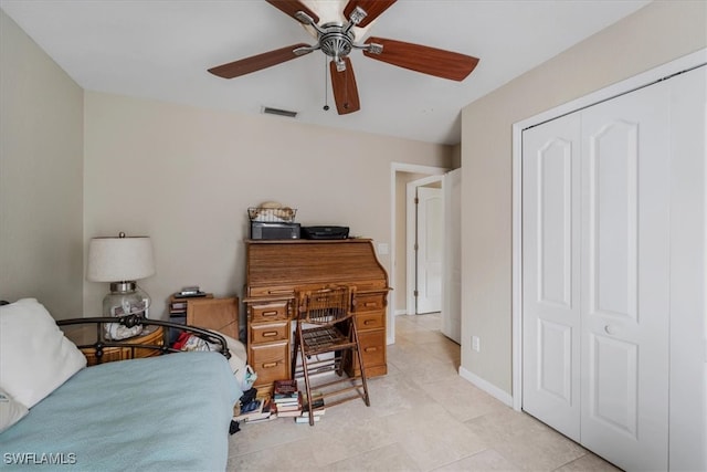 tiled office with ceiling fan