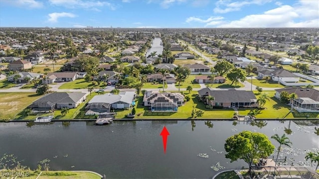 1512 SW 4th Ct, Cape Coral, FL 33991 - aerial view of residential area with a large body of water