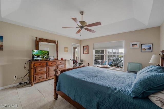 1512 SW 4th Ct, Cape Coral, FL 33991 - bedroom with light tile patterned floors, baseboards, and ceiling fan
