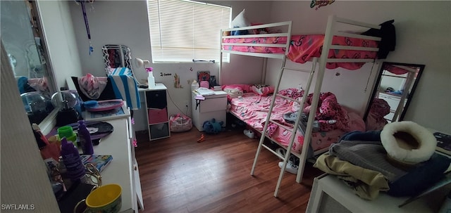 bedroom featuring hardwood / wood-style floors