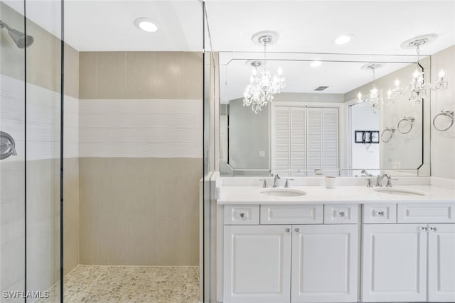 bathroom with vanity and an enclosed shower