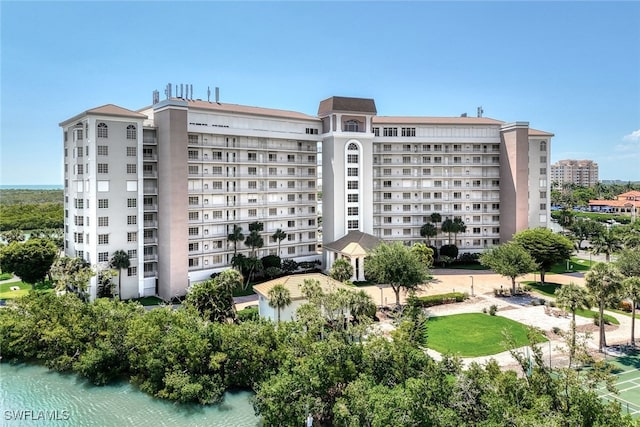 view of building exterior featuring a water view