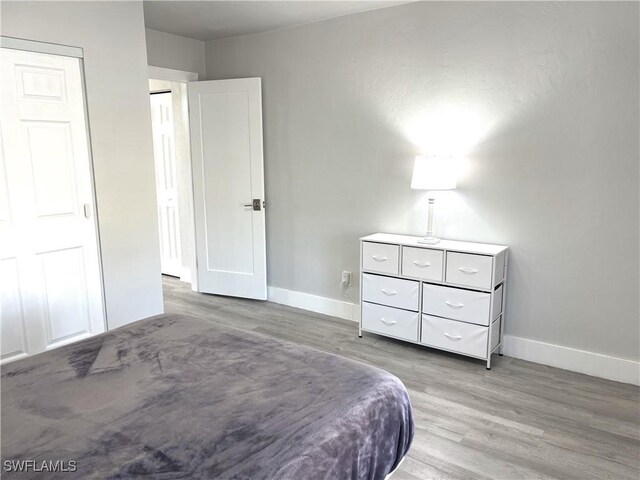 bedroom featuring light wood-type flooring