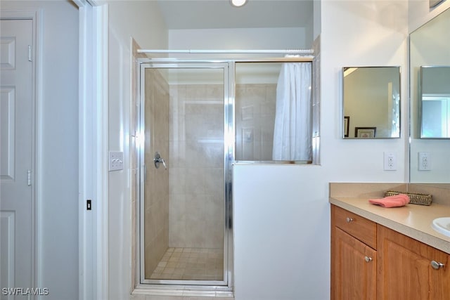 bathroom with vanity and walk in shower