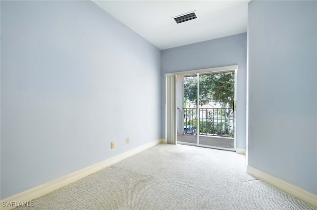 view of carpeted spare room