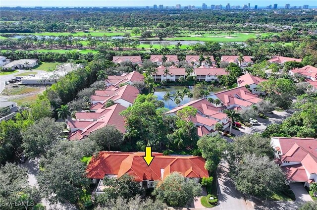 2451 Game Hawk Ct Unit 2502, Naples, FL 34105 - aerial view of residential area with a large body of water and city skyline