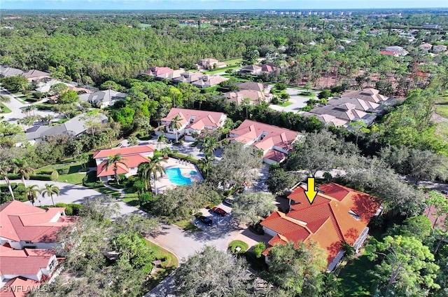 2451 Game Hawk Ct Unit 2502, Naples, FL 34105 - aerial perspective of suburban area featuring a heavily wooded area