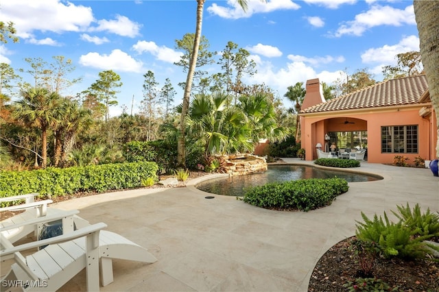 view of community with a patio and a pool