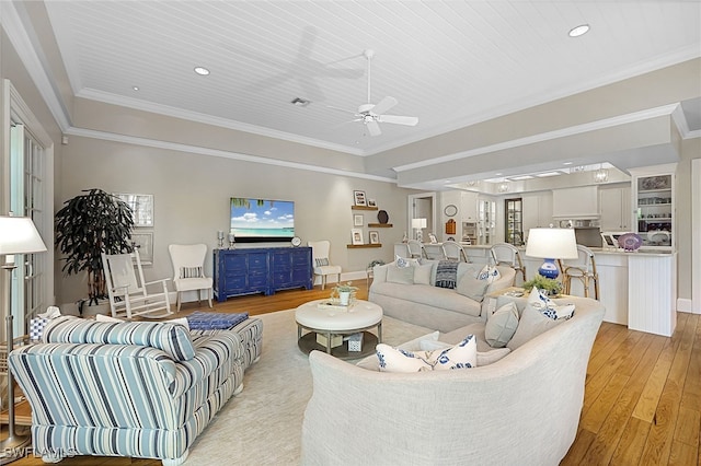 living room featuring ceiling fan, wooden ceiling, light hardwood / wood-style floors, and ornamental molding