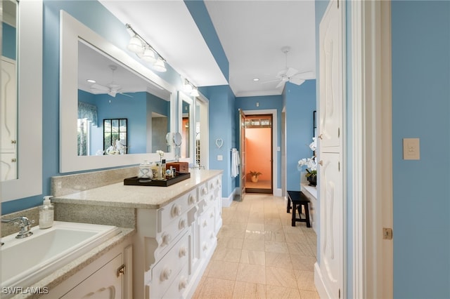 bathroom with tile patterned floors, vanity, and ornamental molding