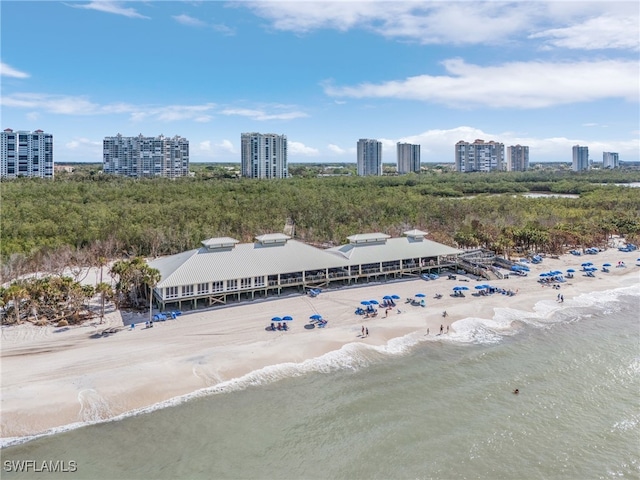 bird's eye view with a beach view and a water view