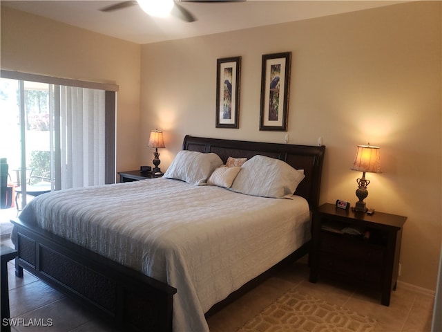 bedroom featuring access to exterior, tile patterned floors, and ceiling fan