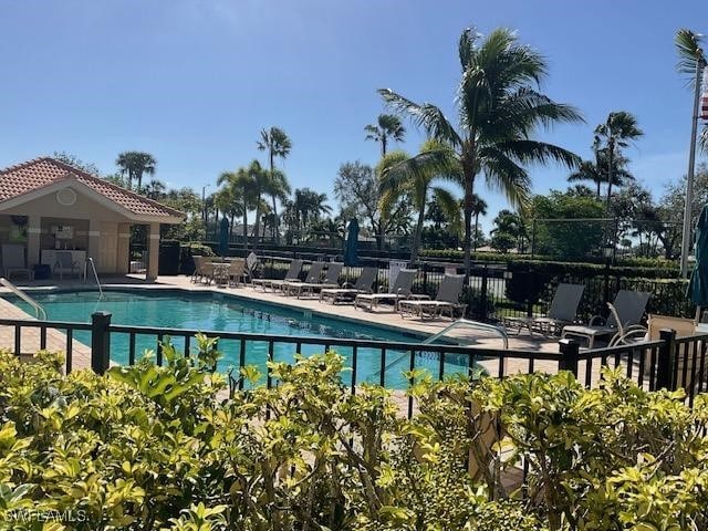 view of swimming pool featuring a patio area