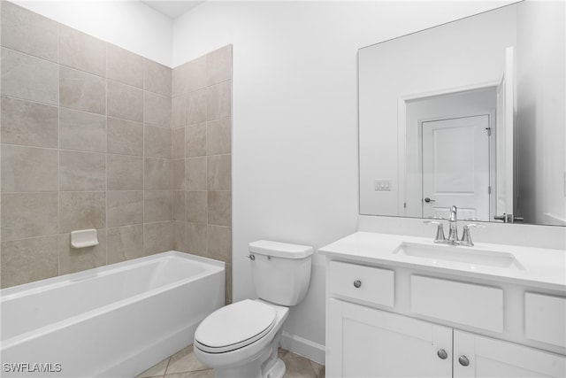 full bathroom featuring tile patterned flooring, vanity, toilet, and tiled shower / bath combo