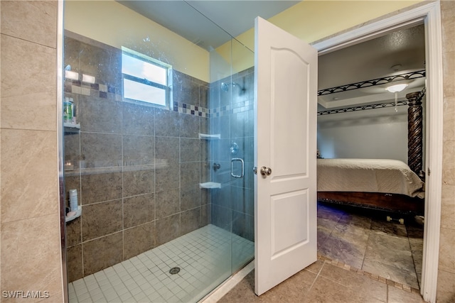 bathroom with a shower with shower door